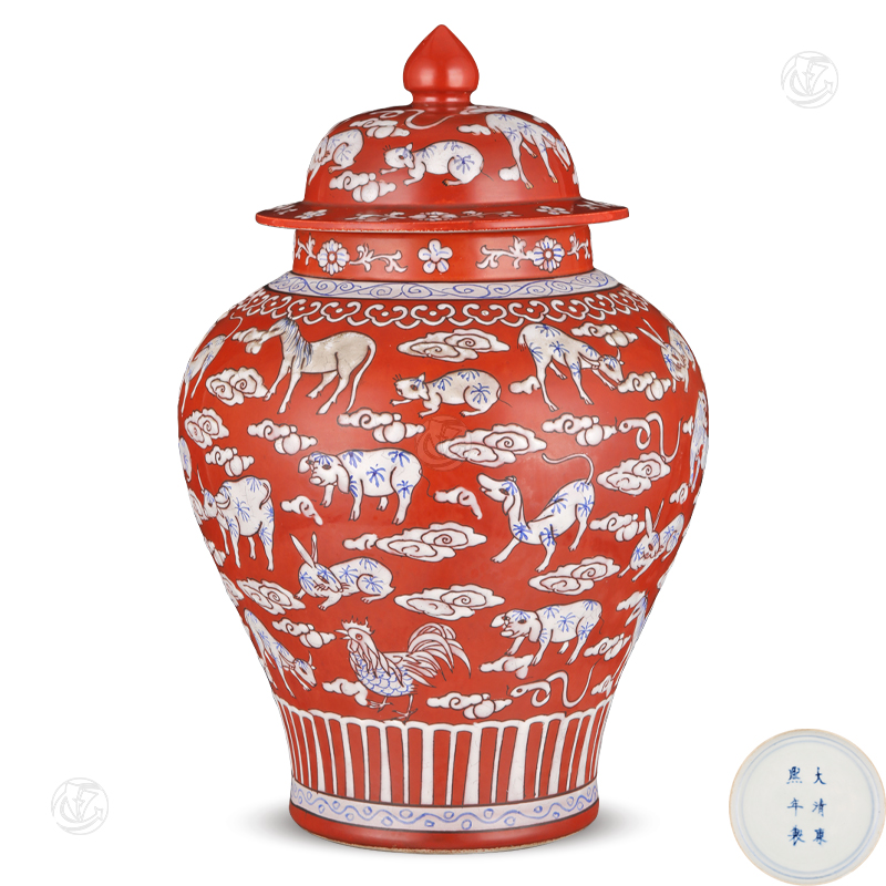 大清康熙年制款矾红地白釉青花十二生肖将军罐